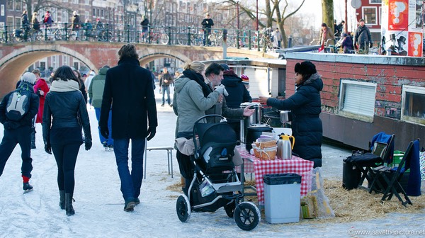 Amsterdam frozen canals, business as usual