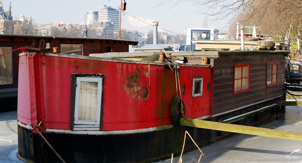 Amsterdam frozen canals, houseboats