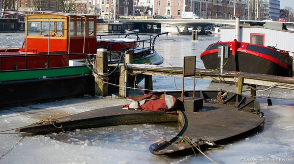 Amsterdam frozen canals, icebreaker