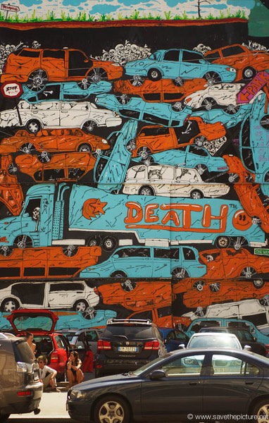 Mural of death, pile of cars Prague