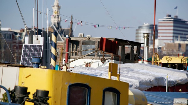 Amsterdam frozen canals, houseboats