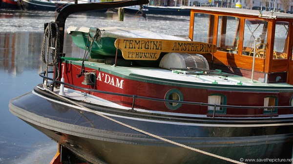 Amsterdam frozen canals, houseboats