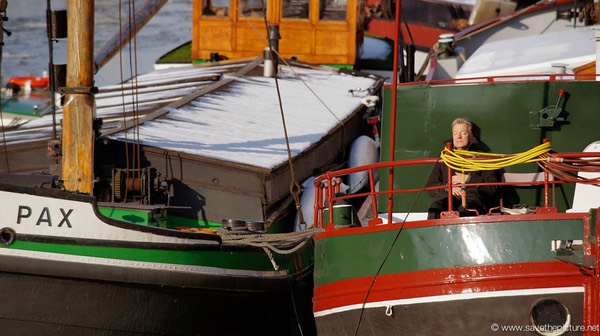 Amsterdam frozen canals, suntanning